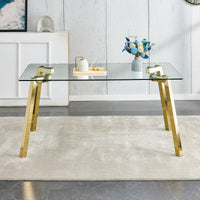 Modern minimalist style rectangular glass dining table with tempered glass tabletop and golden metal legs, suitable for kitchen, dining room, and living room, 63 inches * 35.4 inches * 30 inches